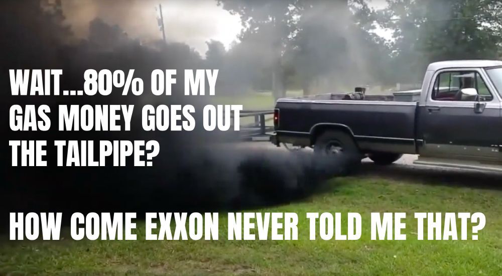 A pickup truck belching a big cloud of black exhaust. Inside the cloud in white text: Wait, 80% of my gas money goes out the tailpipe? How come Exxon never told me that?